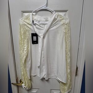 Fashion Nova White blouse with Yellow lace sleeves and tie-neck detail M